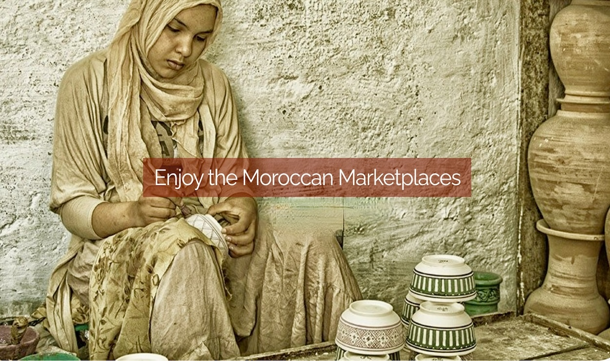 Henna festival workshop in Marrakech, where local artisans teach visitors traditional henna designs and techniques