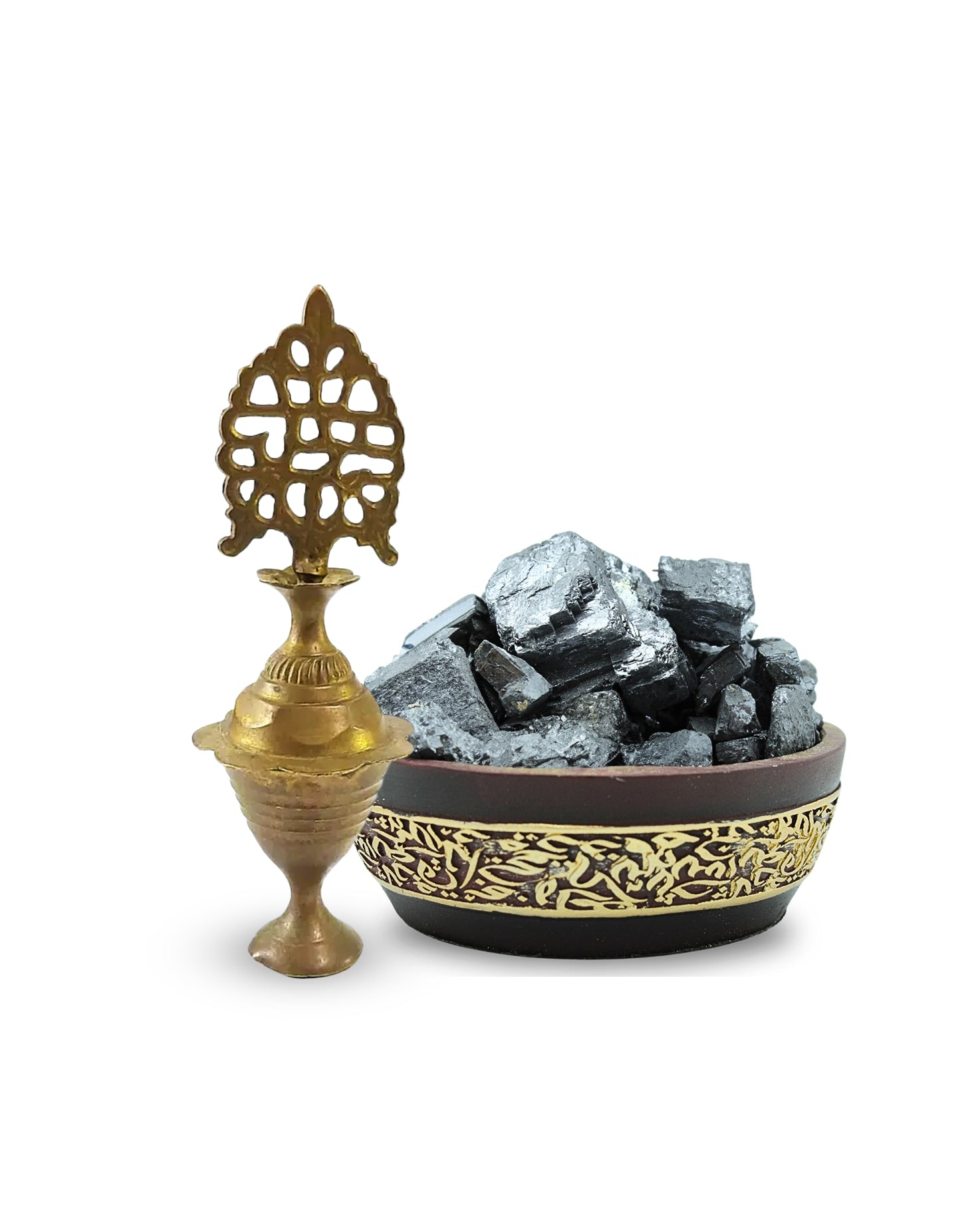A small bowl of powdered khol, alongside a traditional Moroccan makeup brush