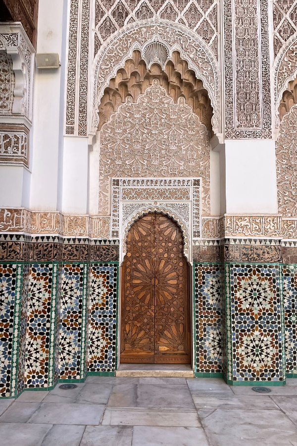 Intricate zellij tile work adorning the walls of a Moroccan mosque