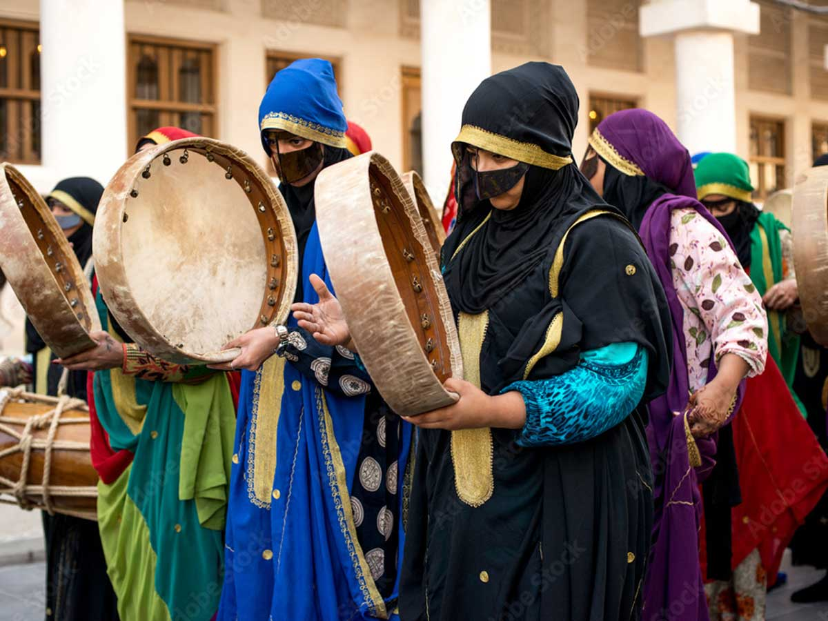 A vibrant Moroccan festival, with oud vendors, traditional music, and colorful textiles