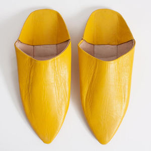 A modern take on the traditional Babouche, with bold colors and contemporary design elements