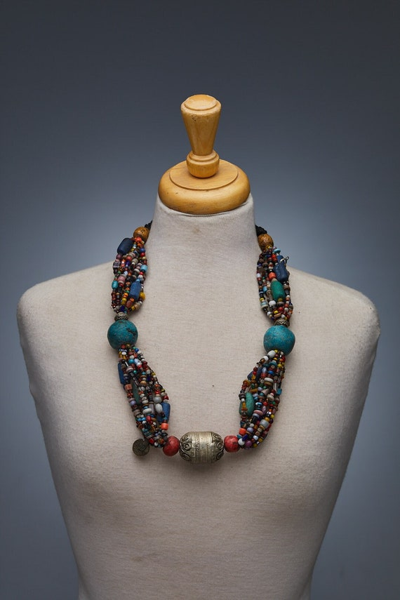 A Tiznit artisan meticulously crafting a silver jewelry piece