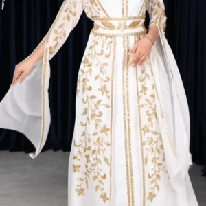 A close-up of an intricately embroidered burnous, showcasing the skilled craftsmanship of traditional artisans.