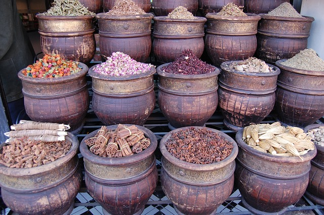 Vibrant spices and herbs on display at a Moroccan souk